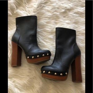 Platform 70s inspired bootie w/ a wood finish heel